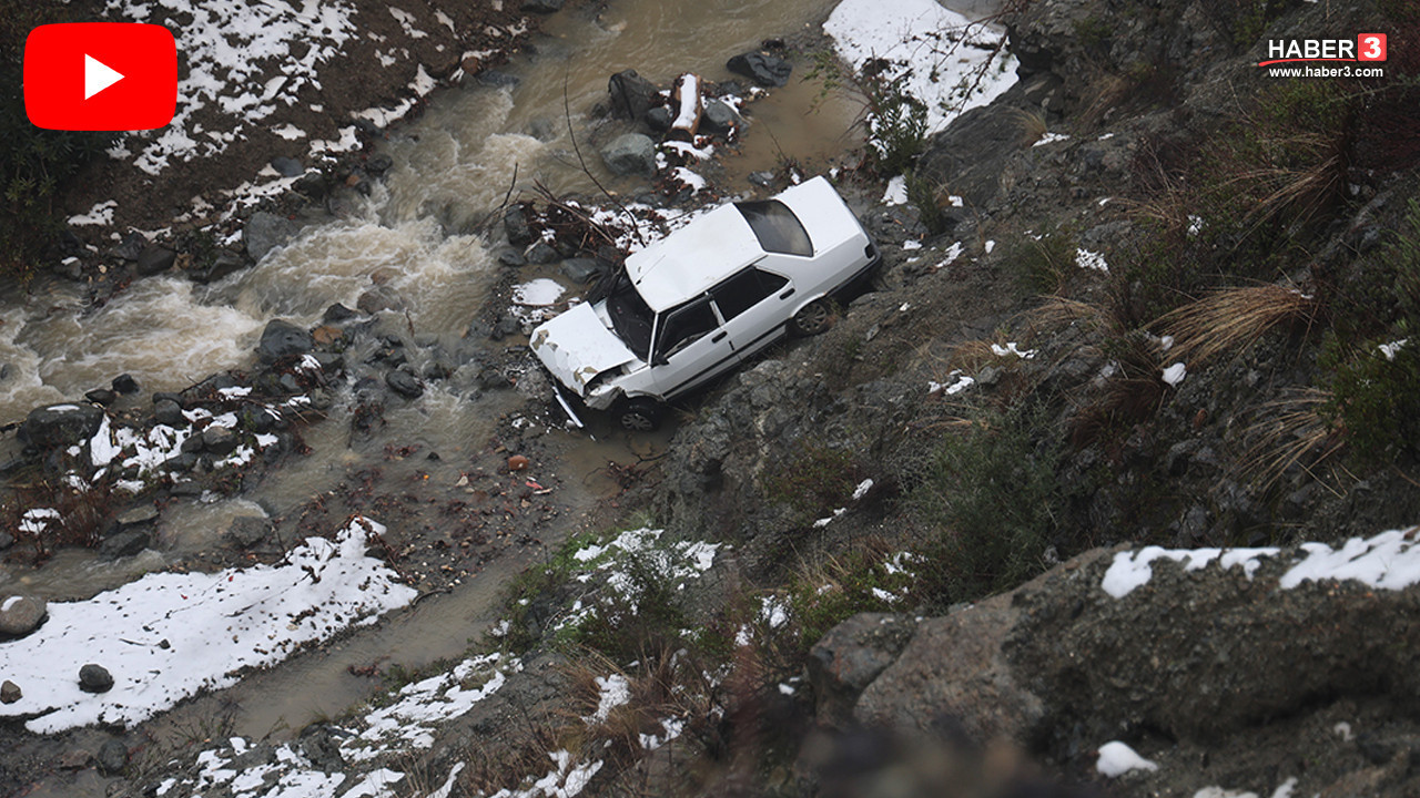 Metrelerce yüksekten dereye uçan otomobilden son anda atlayarak kurtuldu