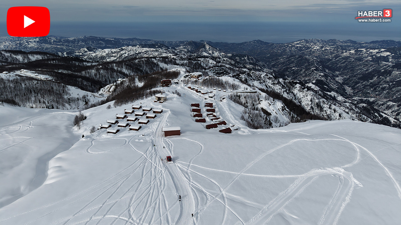 Türkiye'nin deniz manzaralı karlarla kaplı zirvesinde kayak keyfi