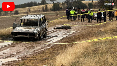 Yanan otomobilin yakınında başı gövdesinden koparılmış bir ceset bulundu!