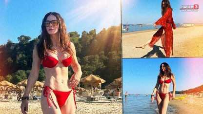 Defne Samyeli İtalya tatilin kırmızı bikinili şovuyla genç kızlara taş çıkarttı!