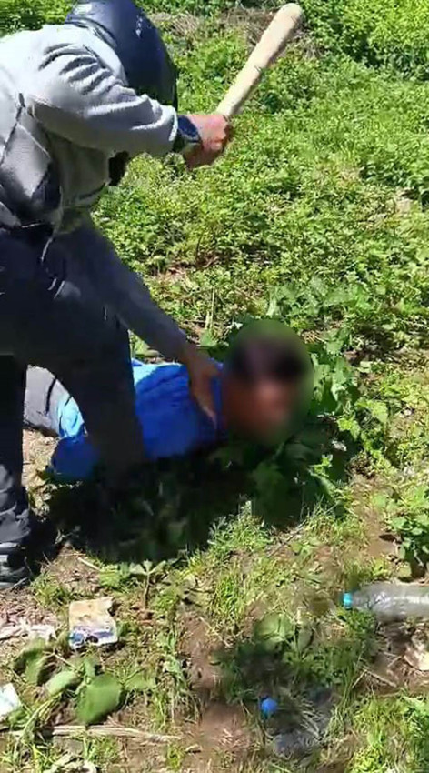 Kasklı canilerin güpegündüz kan donduran işkencesi kamerada - Resim: 1