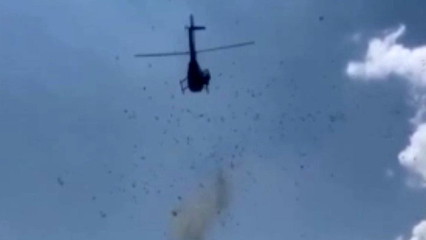 Böyle vasiyet görülmedi! Helikopterden para saçtılar