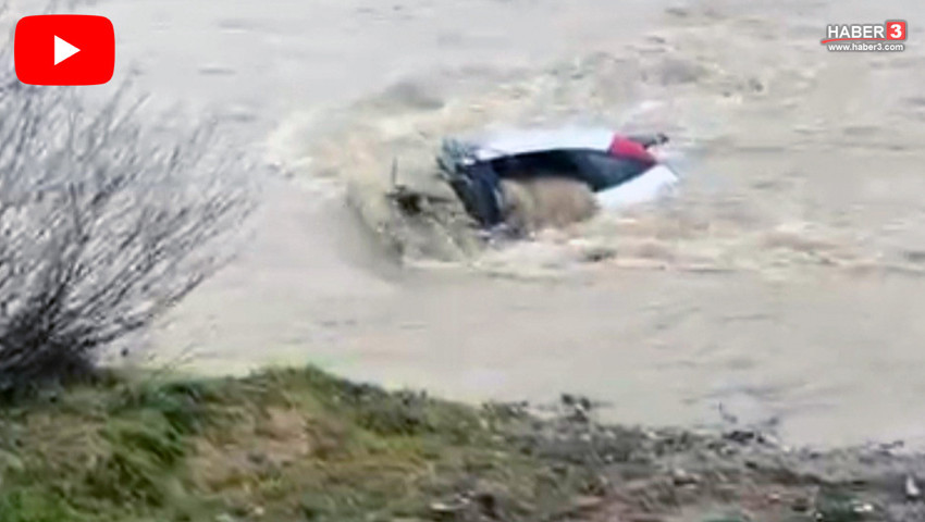 Bir kişiyi dereye uçan otomobilinin içinde ölmekten vatandaşlar kurtardı