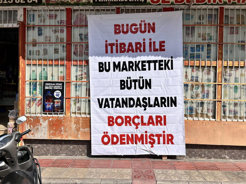 Yüzlerce depremzedenin veresiye defterini kapattı - Resim: 2